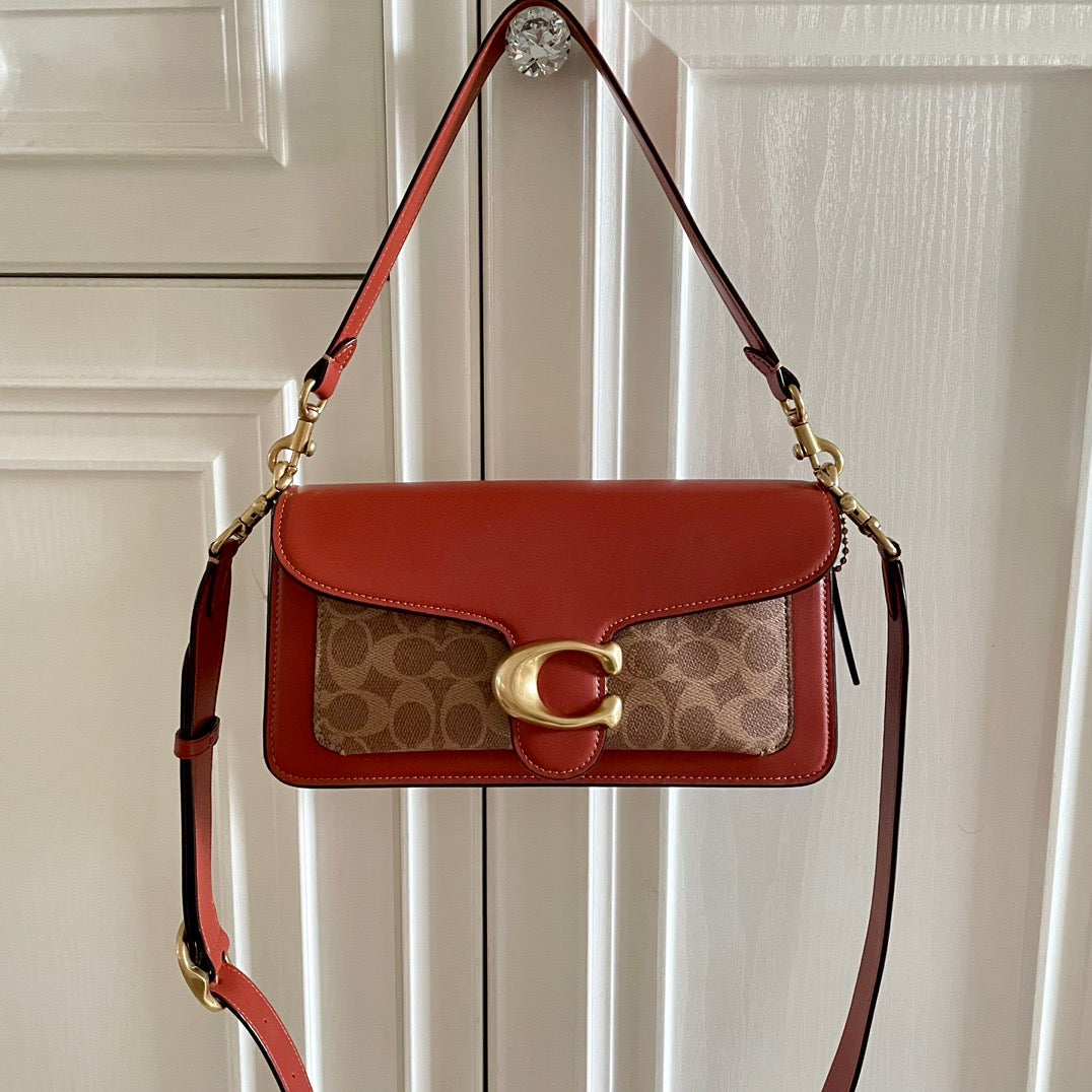 Authentic Co*ch Tabb*y Coated Canvas Signature in Tan Rust