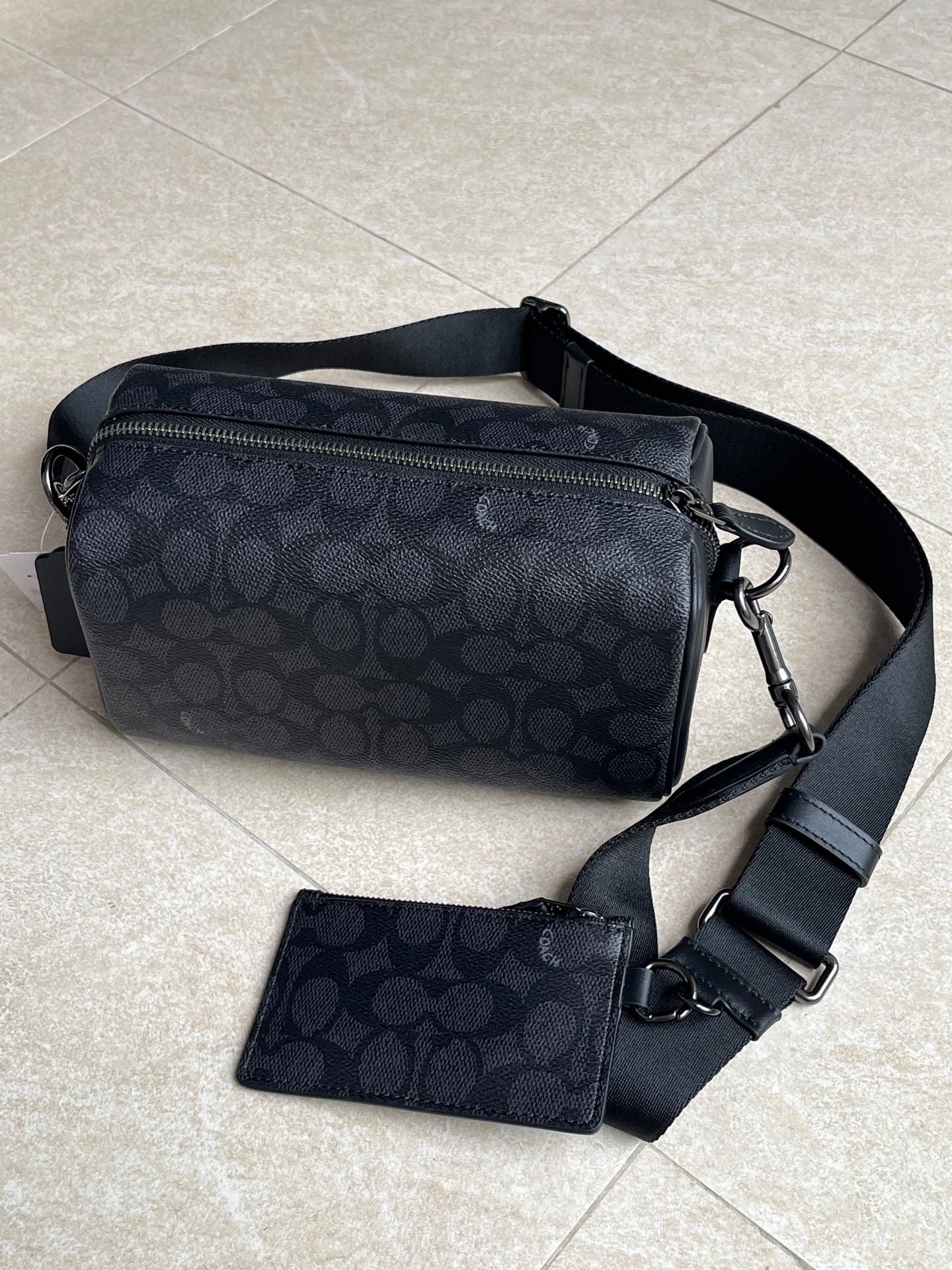 Authentic Co*ch Crossbody Bag
In Signature Canvas