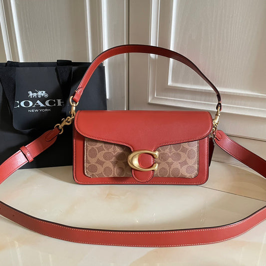 Authentic Co*ch Tabb*y Coated Canvas Signature in Tan Rust