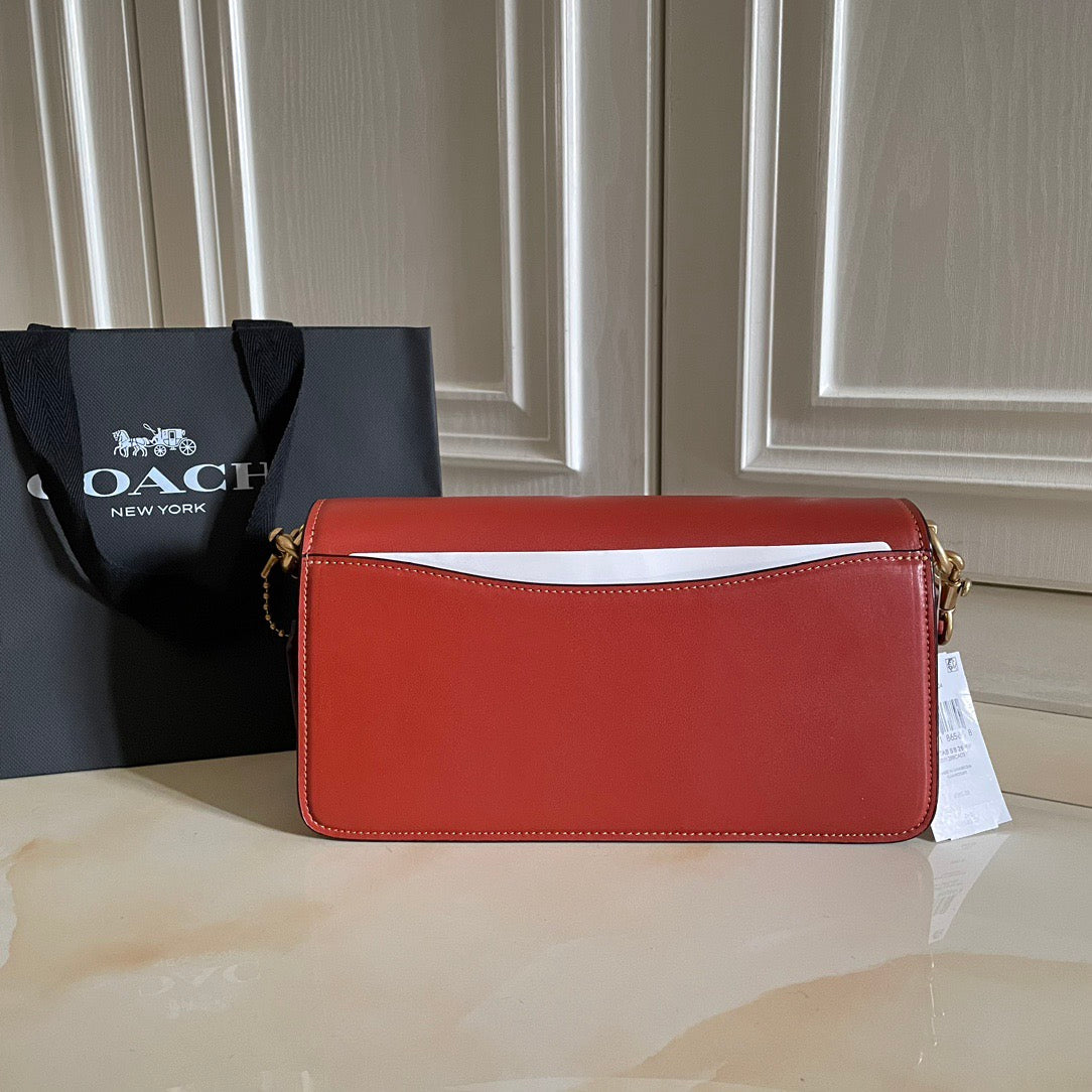 Authentic Co*ch Tabb*y Coated Canvas Signature in Tan Rust