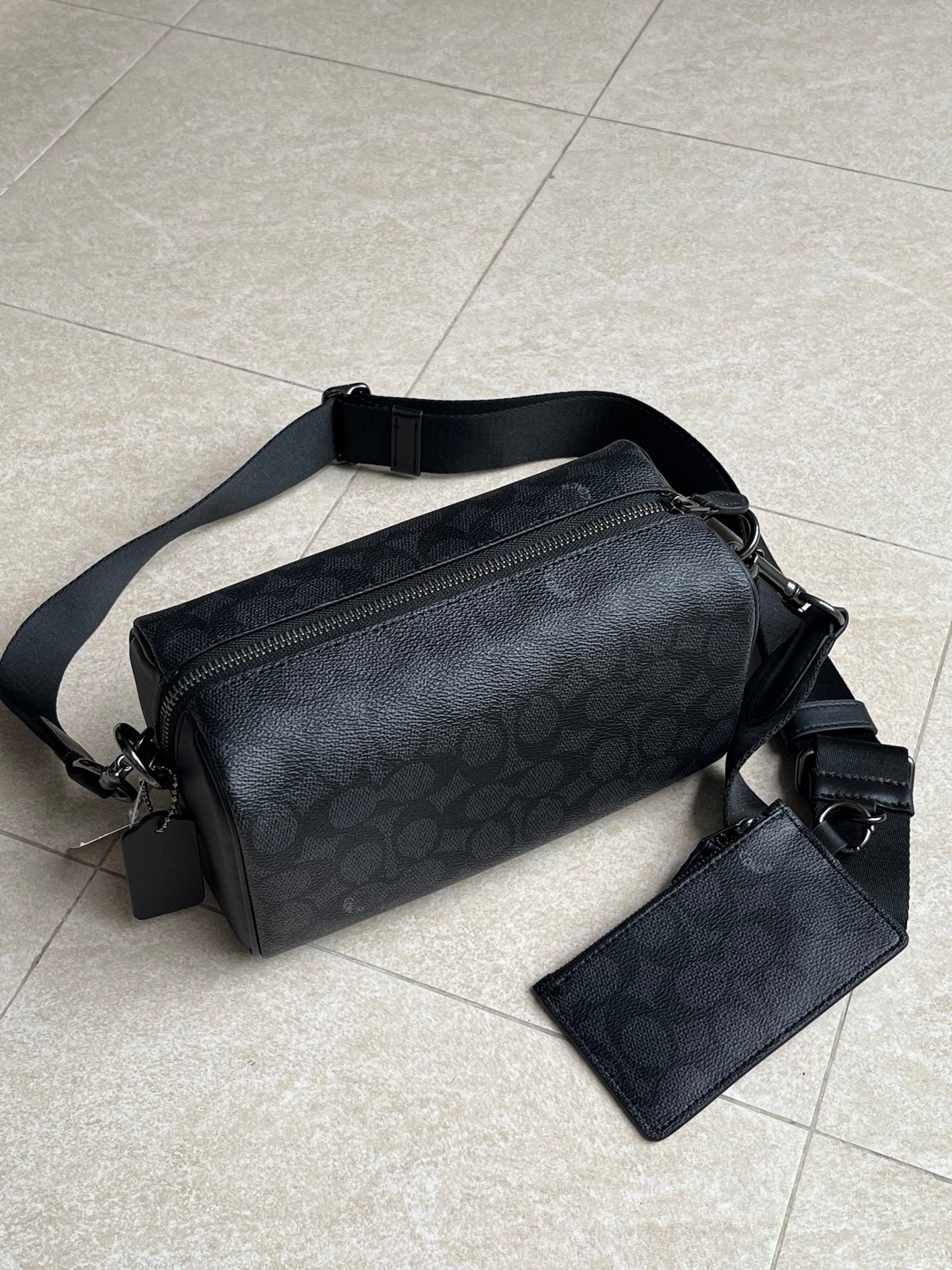 Authentic Co*ch Crossbody Bag
In Signature Canvas