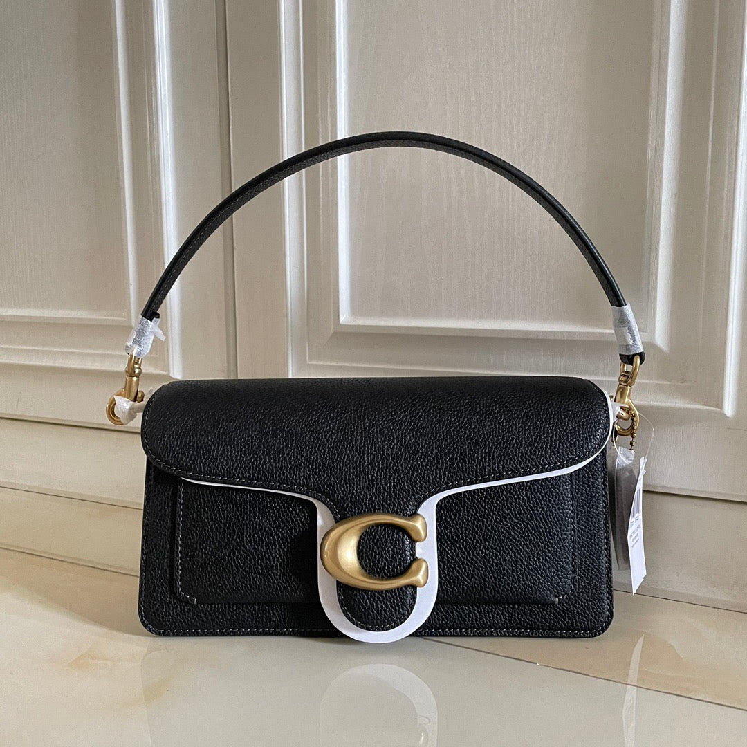 Authentic Co*ch
Women Polished Tabb* Pebble Leather
Shoulder Bag