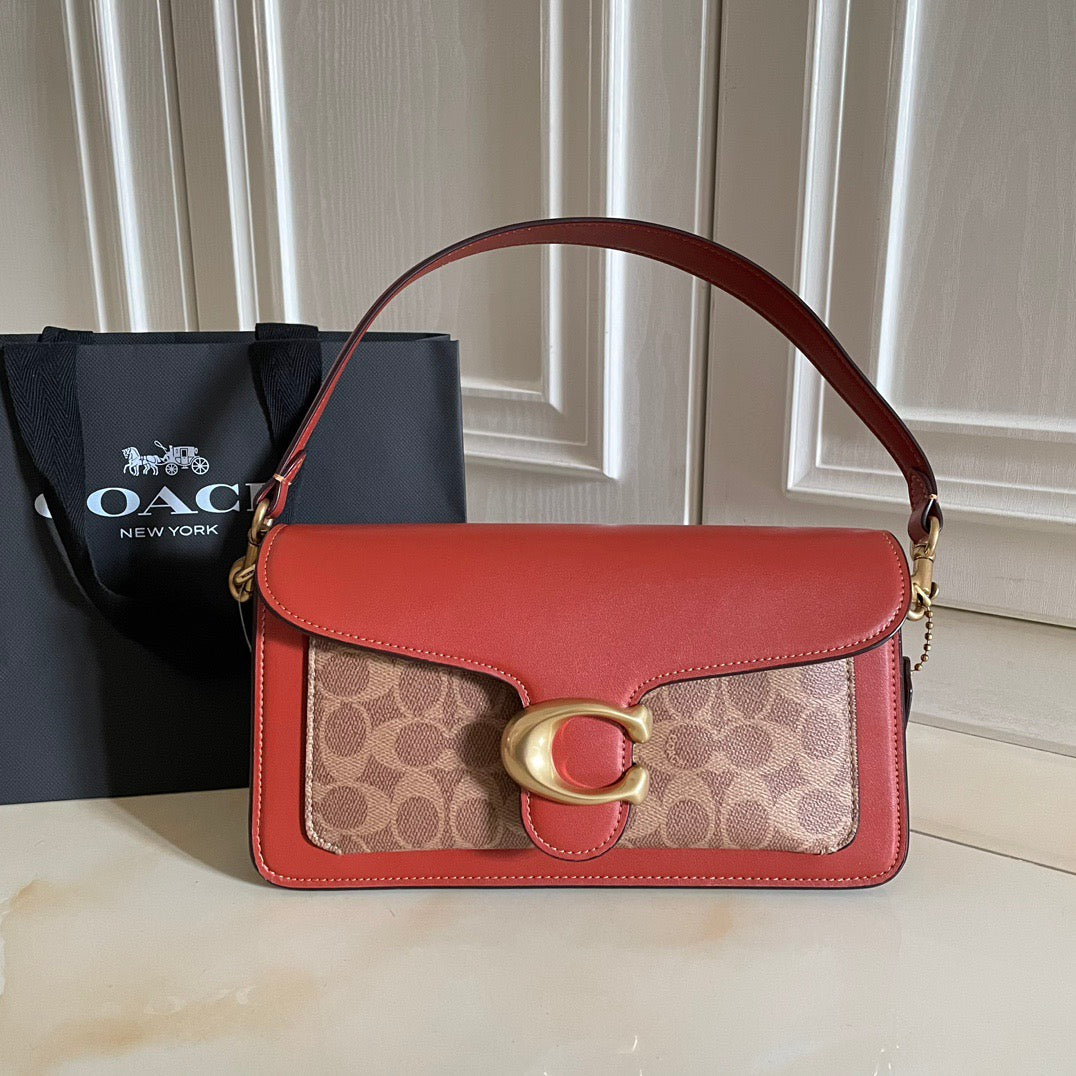 Authentic Co*ch Tabb*y Coated Canvas Signature in Tan Rust