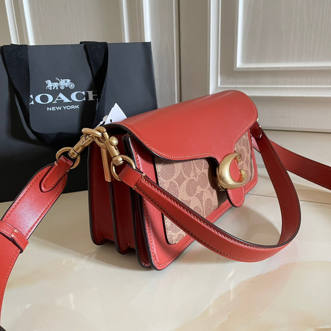 Authentic Co*ch Tabb*y Coated Canvas Signature in Tan Rust